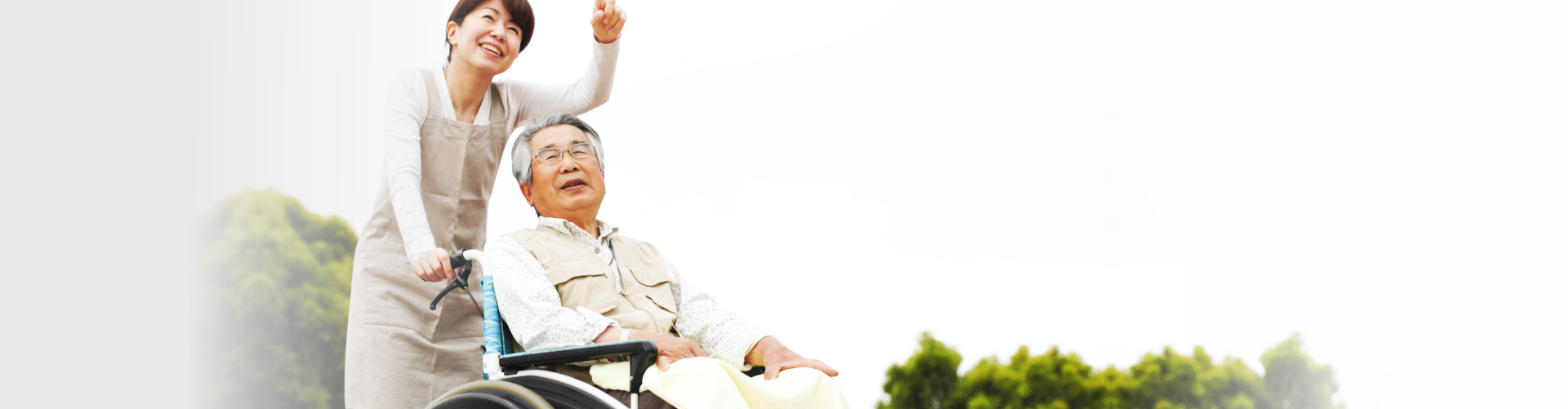 caregiver and senior laughing